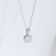 {"en-us":"Shop Diamond Pendants and Necklaces at Diamonds Direct"} {"en-us":"solitaire diamond pendant on a white gold chain"}